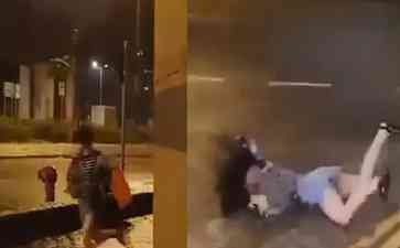 台风过境中女子被强风吹倒滑行数米,场面惊险
